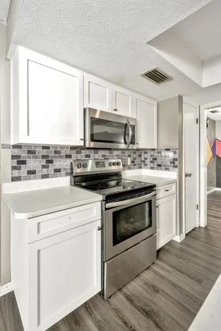 Kitchen leading to dining room