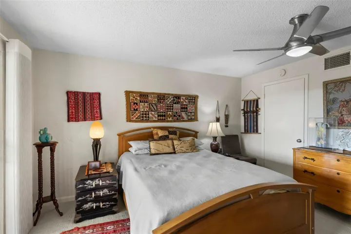 bedroom on first floor with large walk-in closet - again overlooking water &amp; private access to porch