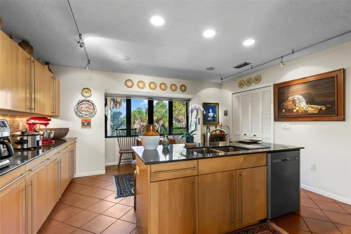 kitchen looking to front of house. Large pantry to the left