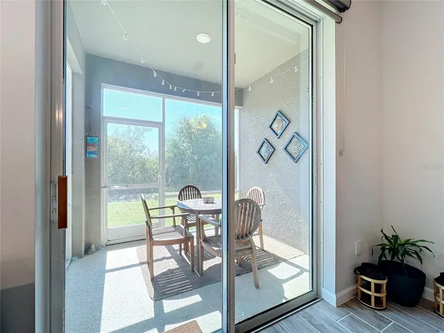 Entry from Dining Room to Screened Patio