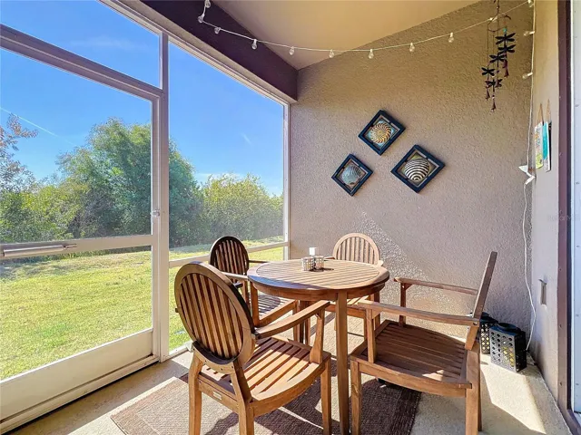 Dine Al Fresco on Screened Patio