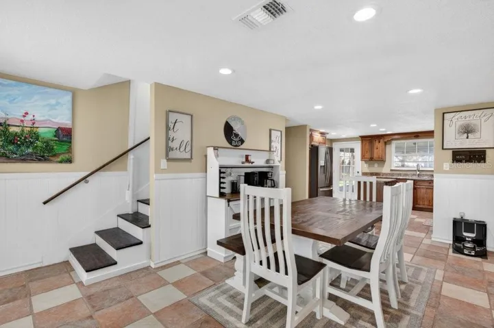 Dining area opened up to kitchen.
