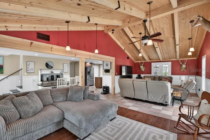 2 separate sitting areas in living room.