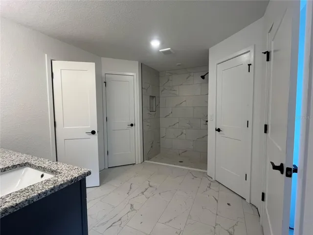 Under construction. Pic is for reference only. This pic is from a similar model in another community.