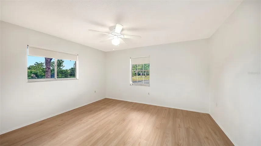 The primary bedroom is of a generous size.