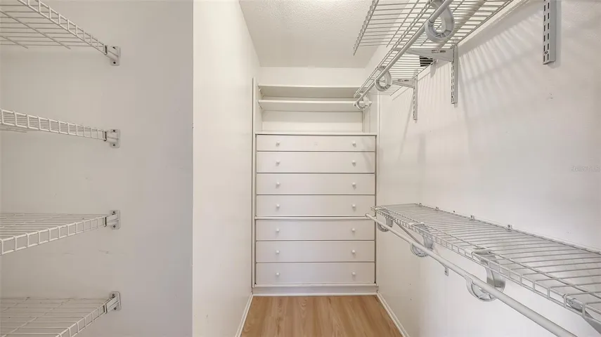 Walk-in closet in the second bedroom.