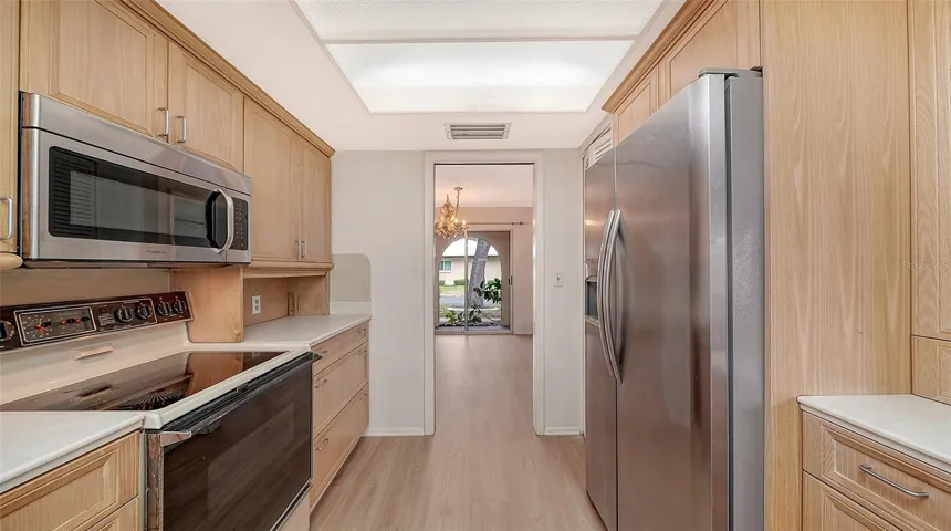 The kitchen leads right into the dining room.  Perfect for entertaining family and friends.