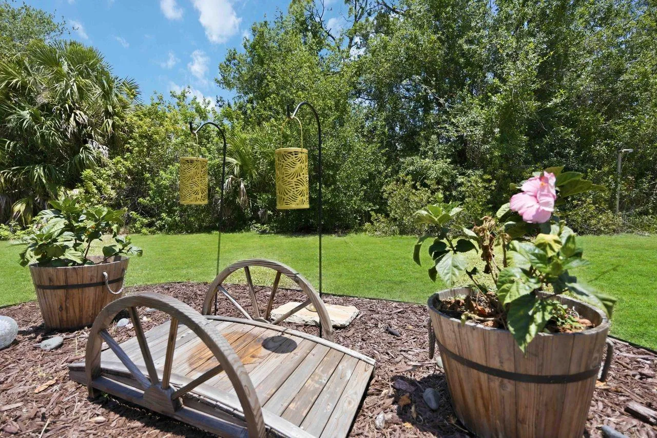 Backyard retreat with charming garden accents