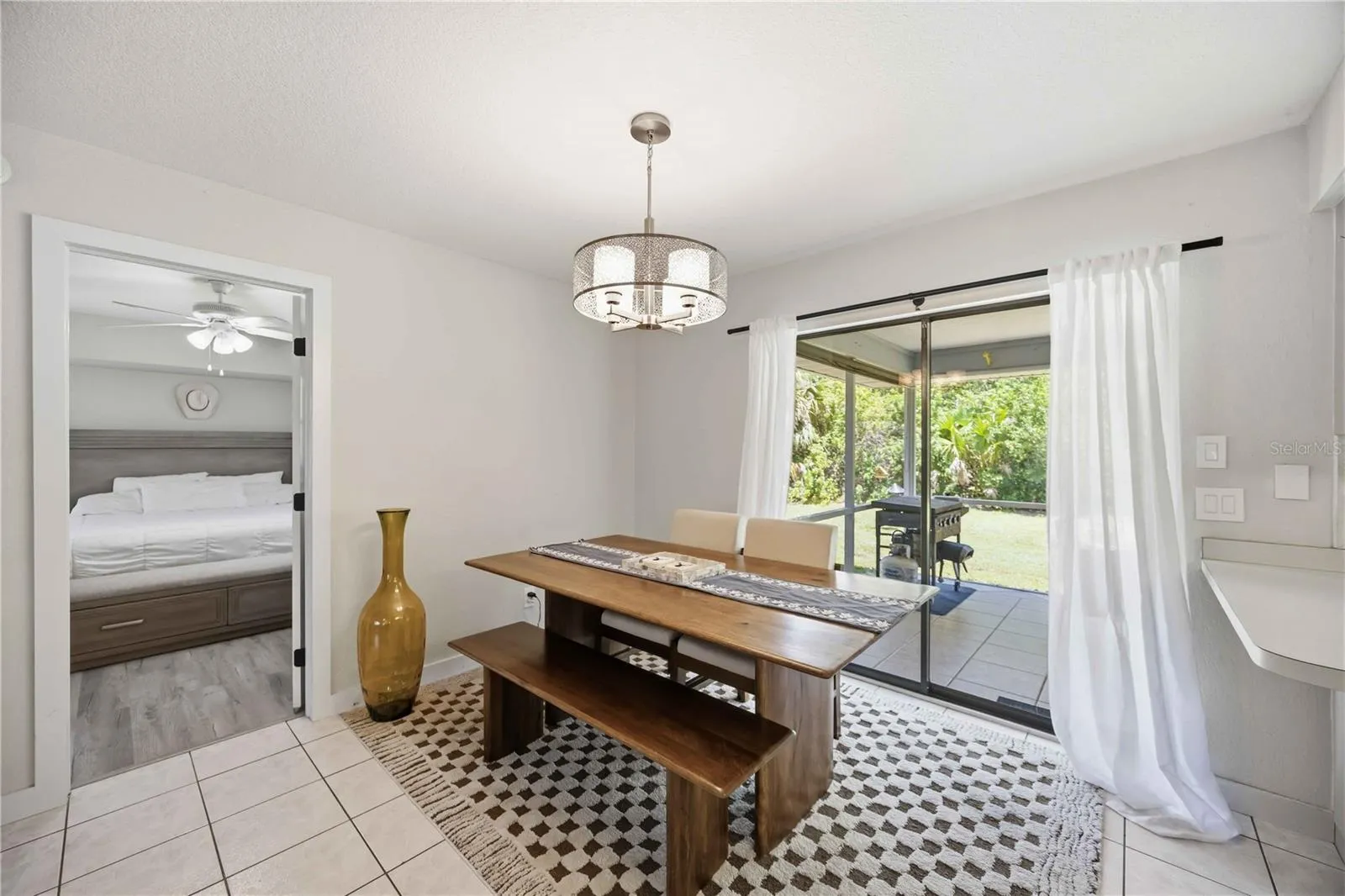 Dining room with sliding door to covered lanai