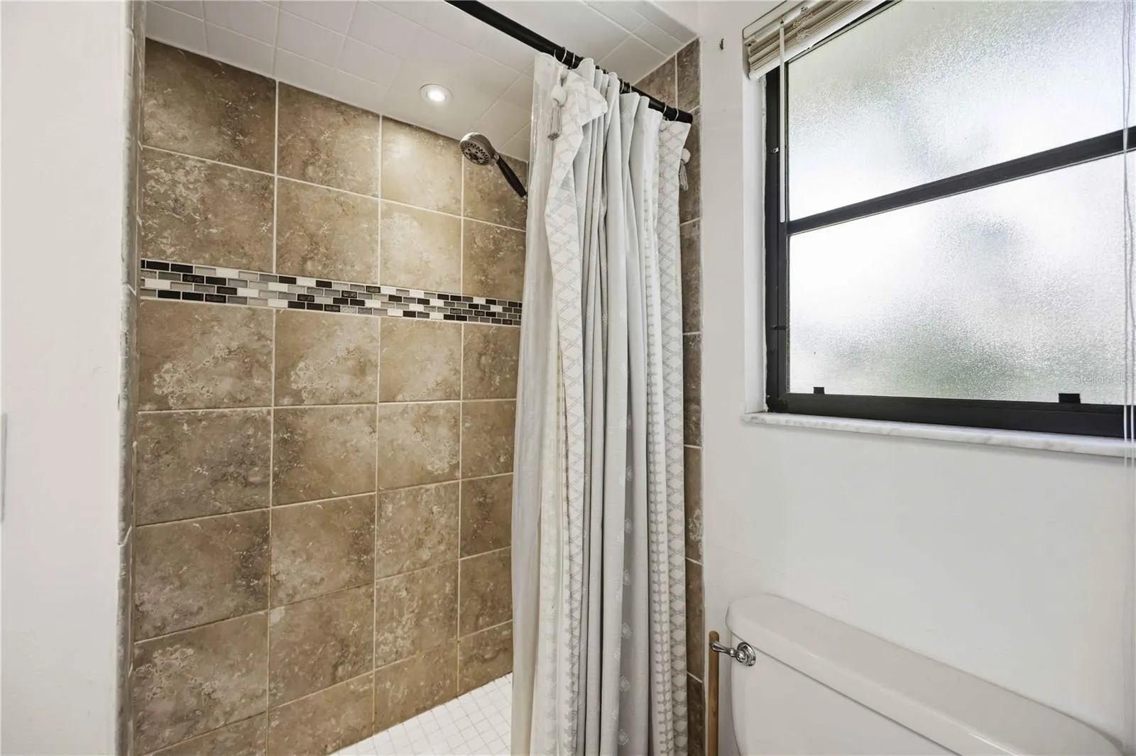 Primary bedroom large walk in shower
