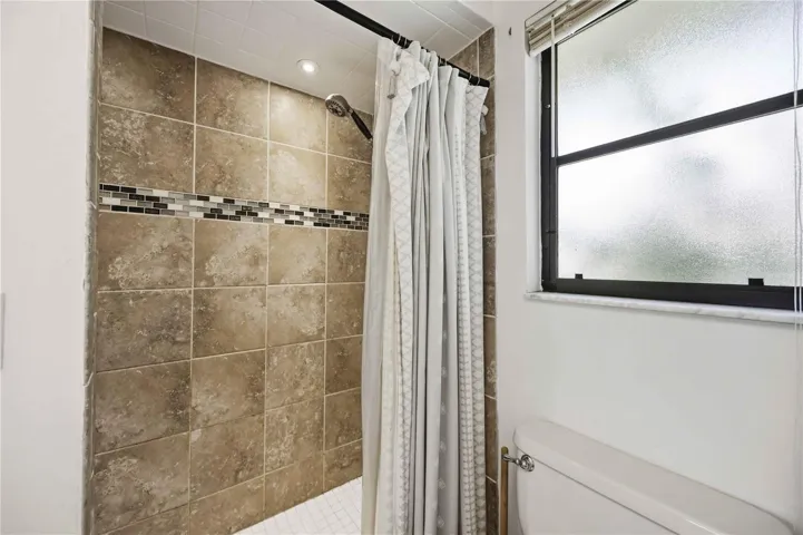 Primary bedroom large walk in shower