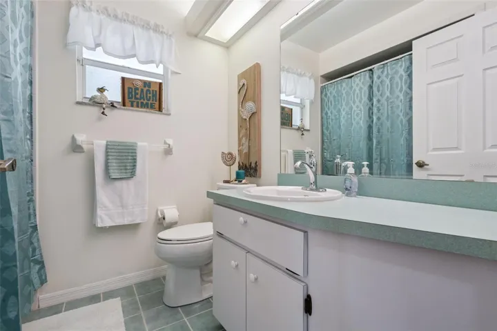 Guest Bathroom offers a tub/shower unit