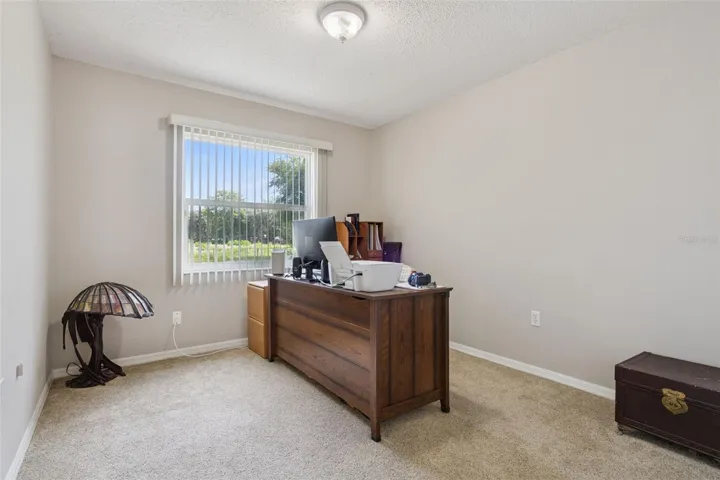 Bedroom #3 offers restful views of the backyard