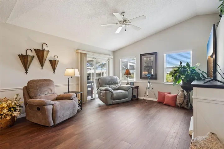 Upgraded Pella sliding glass doors leading to the screened lanai