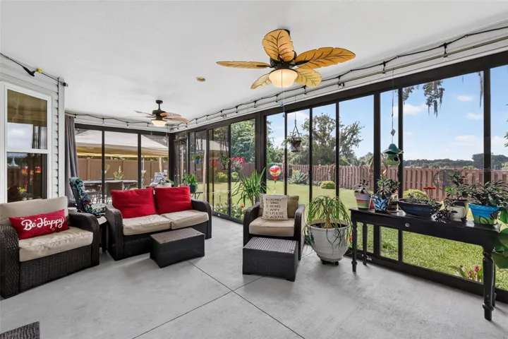 Glass-Enclosed Lanai with Patio and PRIVATE Fenced Yard with ROOM FOR A POOL