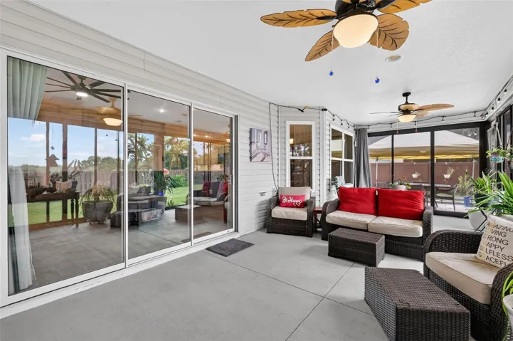 Glass-Enclosed Lanai with Patio