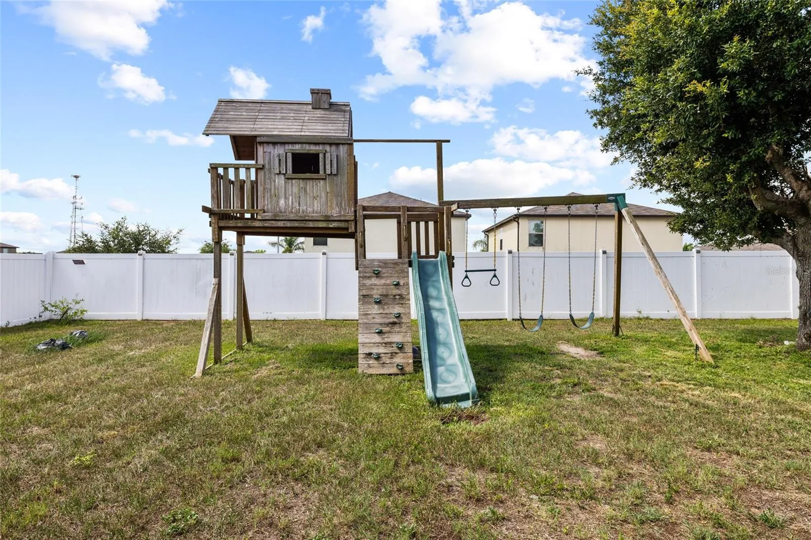Private backyard play area offering ample space for recreation and outdoor enjoyment.