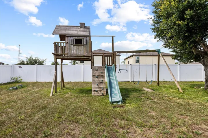 Private backyard play area offering ample space for recreation and outdoor enjoyment.