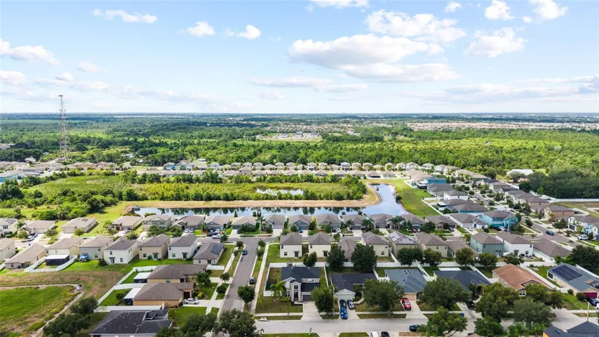 Aerial view showcasing the oversized corner lot and desirable location within Ayersworth Glen.