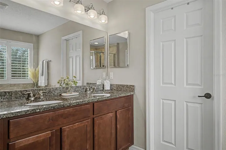 Granite countertops in primary bathroom