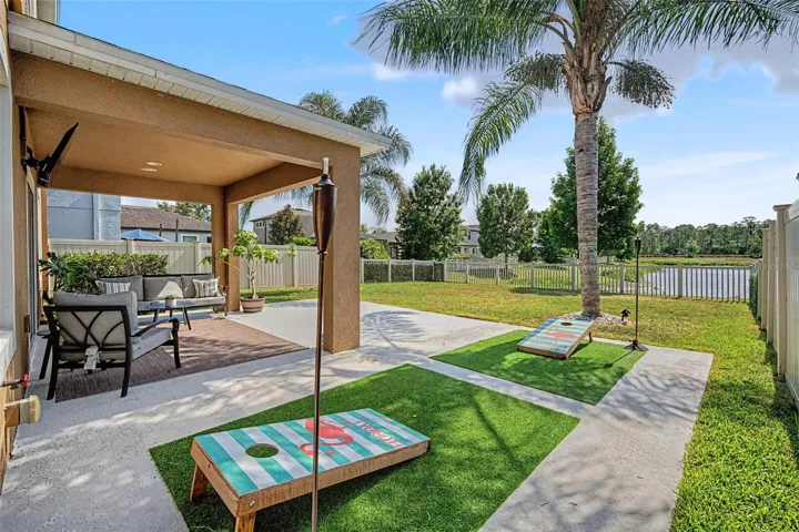 Fenced-in backyard with year 'round water views