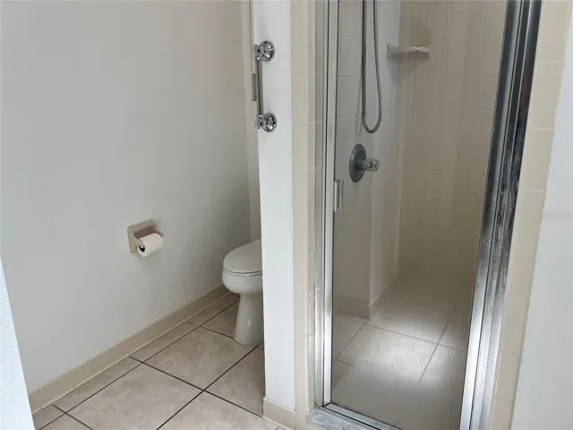 primary bathroom large shower with bench