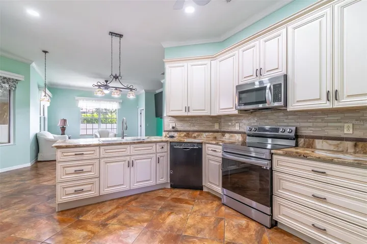 Kitchen opens to Family Room