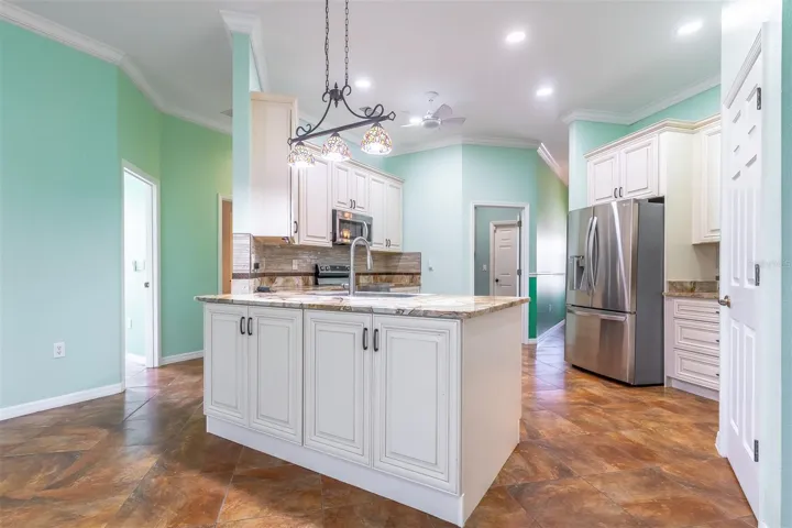 Kitchen opens to family room