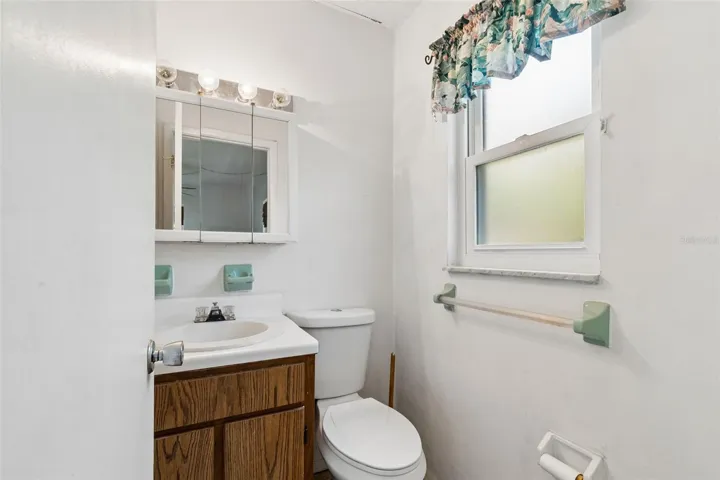 Half bath off of primary bedroom