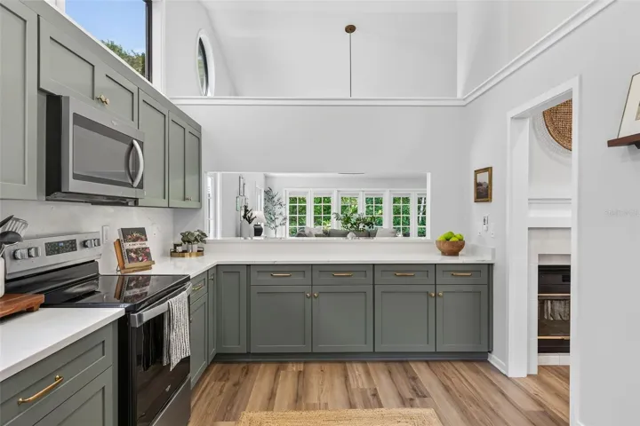 The chef can interact while entertaining with the open connection to Great room