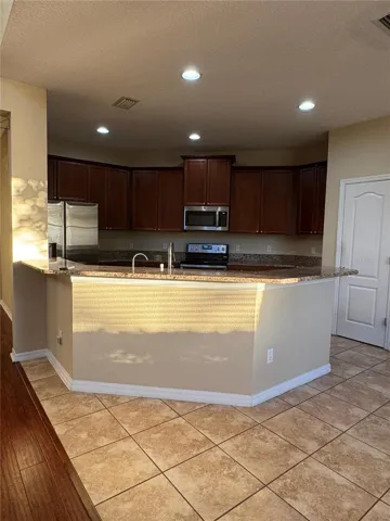 Kitchen opens up to Living Room and Eat in area