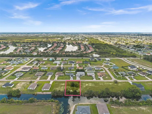 Beautiful freshwater intersecting canal lot in NE Cape Coral