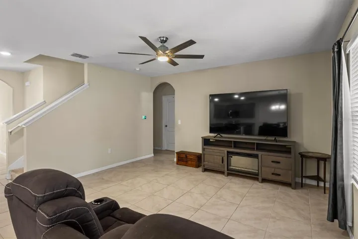Living room looking towards hallway with downstairs bedroom and bathroom