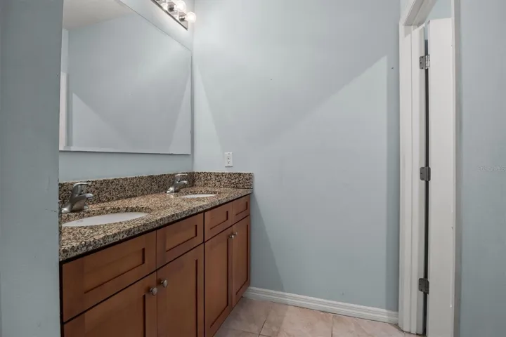 Guest bathroom upstairs with 2 sinks