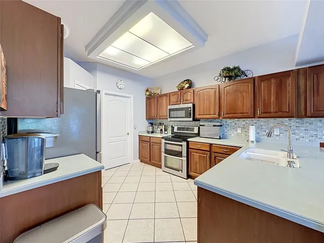 Kitchen has Corian counter tops