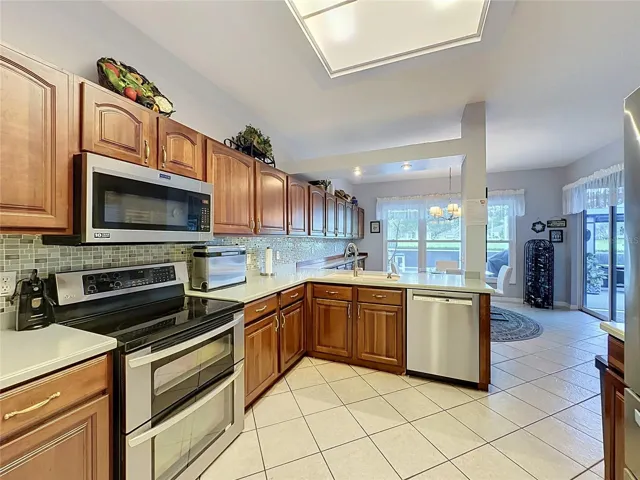 Kitchen - stainless appliances remain