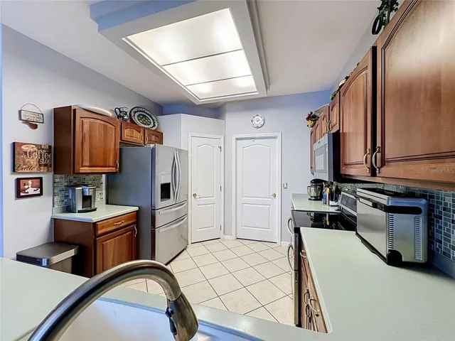 Kitchen has walk in pantry