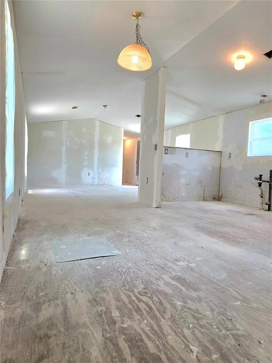 Dining area, kitchen, and living room.