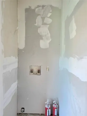 Washer hookups are located in the first bedroom.