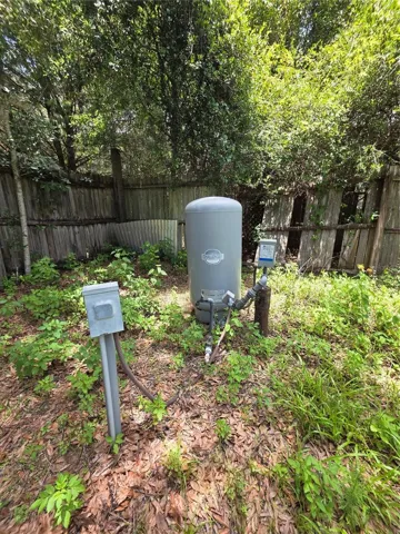 Well is nicely situated in the northwest corner of the backyard.