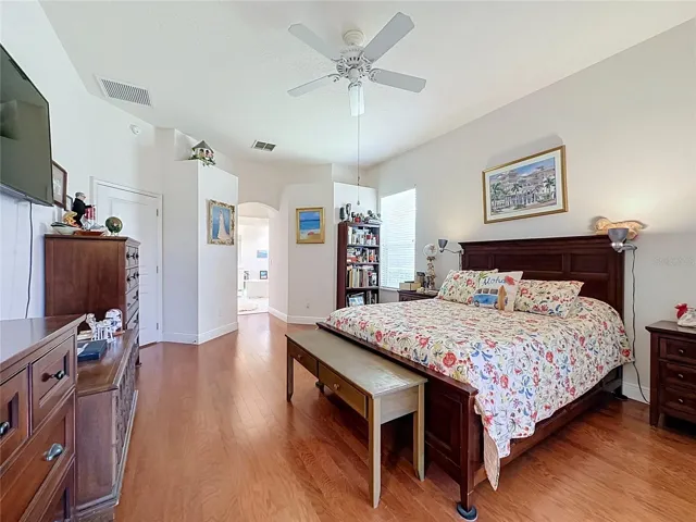 Primary Bedroom has wood flooring