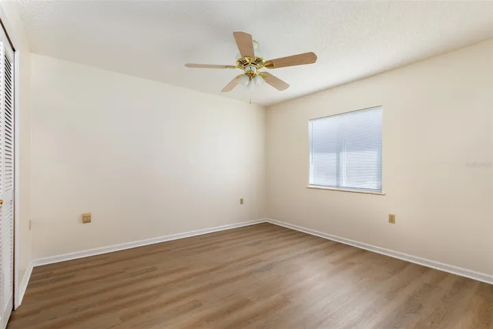 Bedroom #2 (new LPV floors & fresh paint).