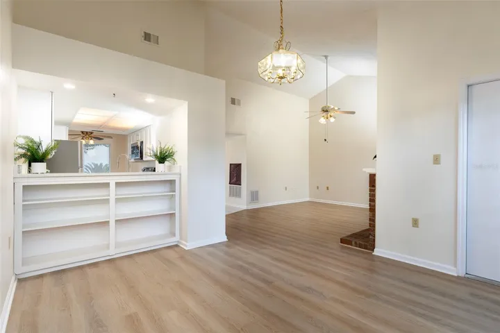 Convenient shelving in dining room.