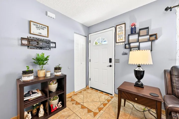 EASY-CARE TILE FLOORING flows throughout the home.