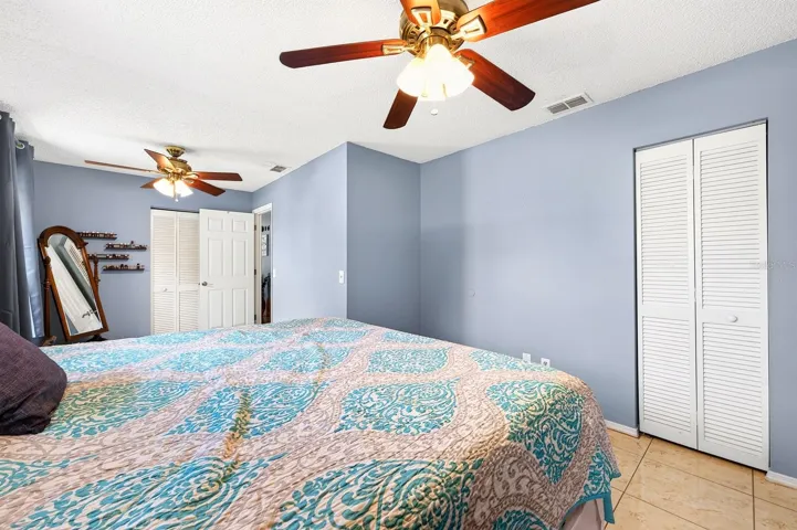 The Primary Bedroom features DUAL CLOSETS and ADDITIONAL SPACE perfect for a reading nook, sitting area, or workspace, creating a versatile and comfortable retreat.