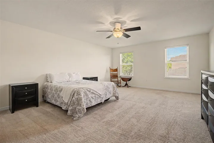 Primary bedroom with room for a sitting area