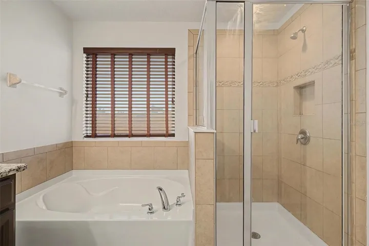 Primary bathroom with separate tub/shower
