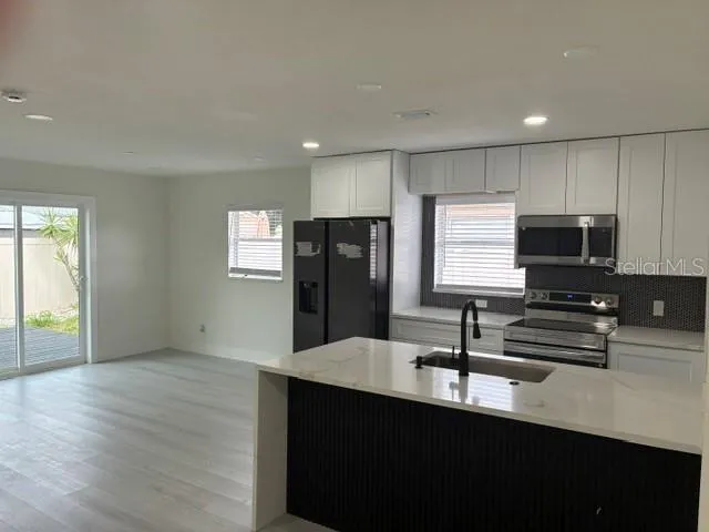 Great Room with Sliders to Deck
