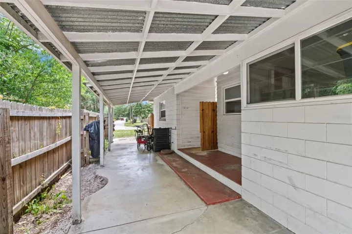 Unit 1 (3 Bedroom, 2 Bathroom Unit) - drive through gate to extra carport