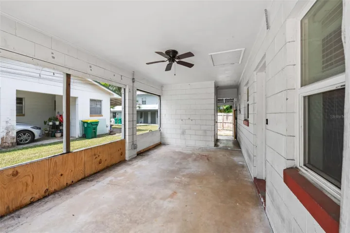 Unit 2 (2 Bedroom 1 Bathroom) screened in porch that can easily be converted back into a carport